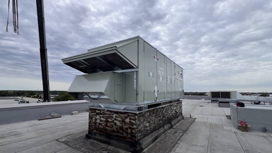 Packaged rooftop unit set on its curb