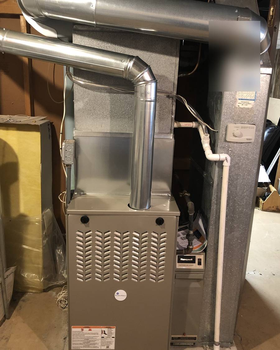 New high-efficiency furnace we installed in a family basement