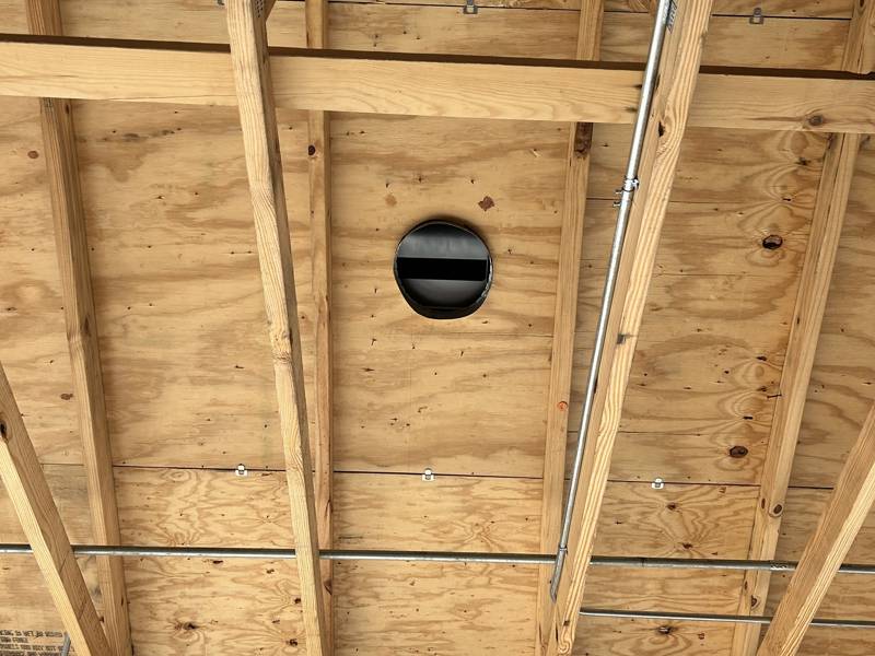 Roof vent opening with damper