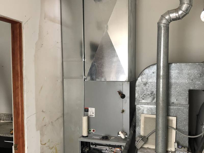 Furnace and coil with a new sheet metal plenum