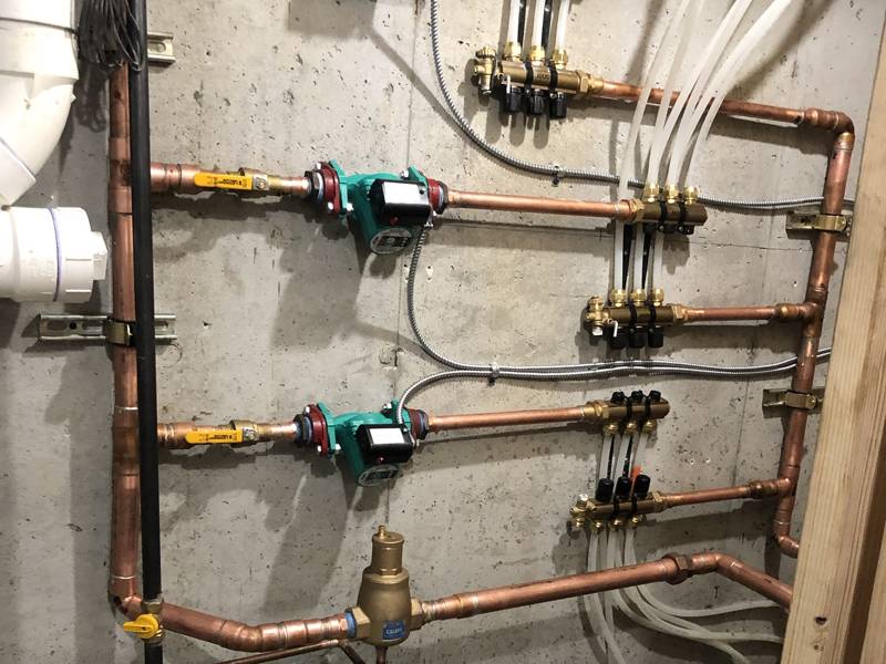 Zone pumps, air separator and expansion tank