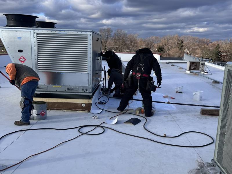 Crew completing a rooftop install