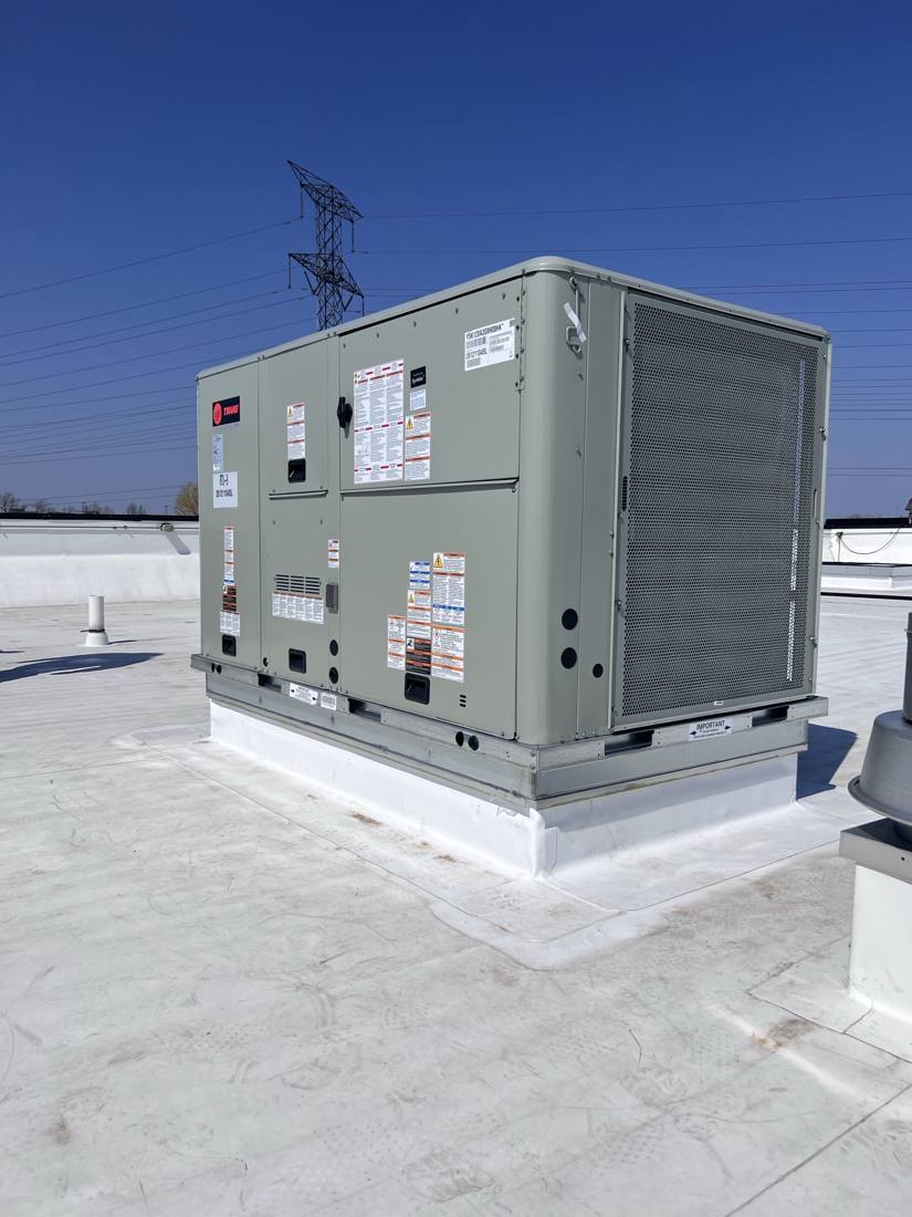 New Trane RTU-9 on the adapted curb
