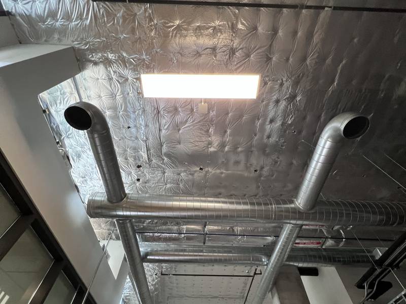 Spiral duct drops in an open ceiling
