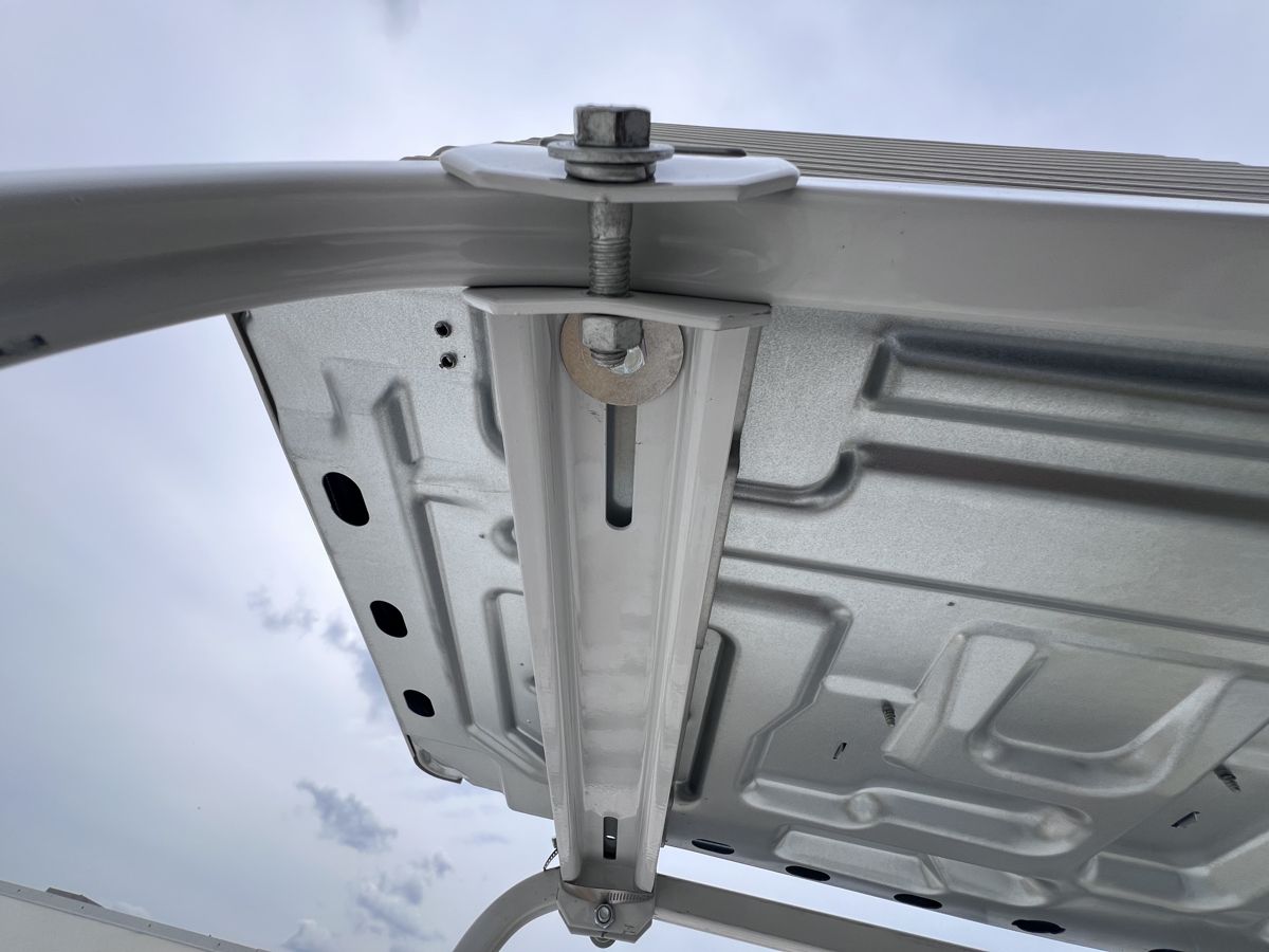 Mounting rail and through-bolt under the unit